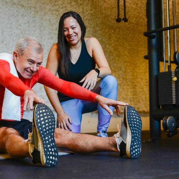 Smiling person feeling energetic after a light workout session.